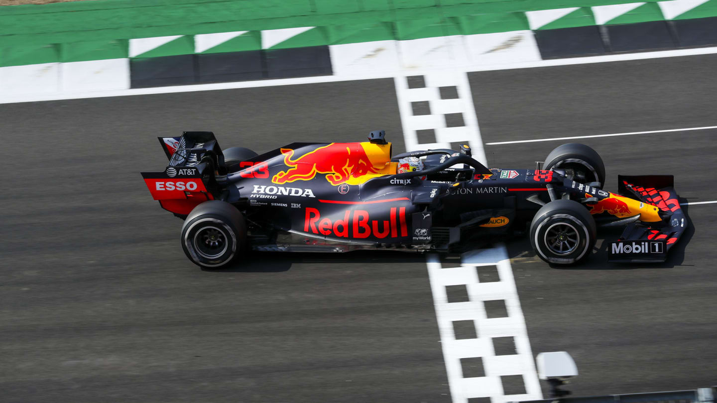 Race Winner Max Verstappen, Red Bull Racing RB16 crosses the finish