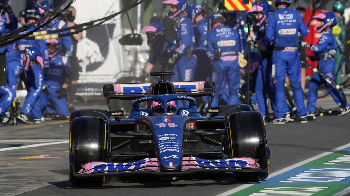 Alpine's Spanish driver Fernando Alonso leaves the pit after a tyre change during the 2022 Formula One Australian Grand Prix at the Albert Park Circuit in Melbourne on April 10, 2022.