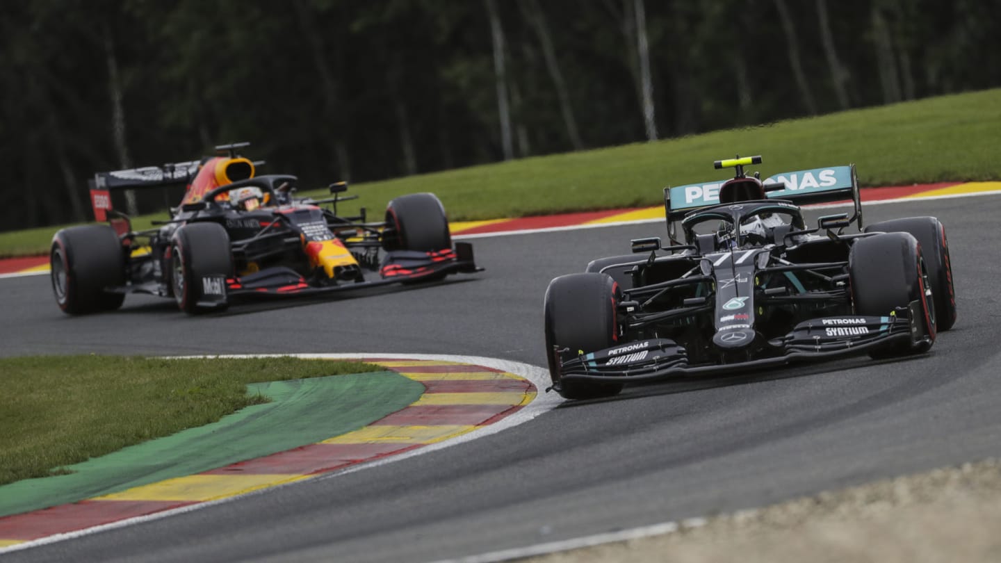 Finnish Formula One driver Valtteri Bottas of Mercedes-AMG Petronas (R) and Dutch Formula One