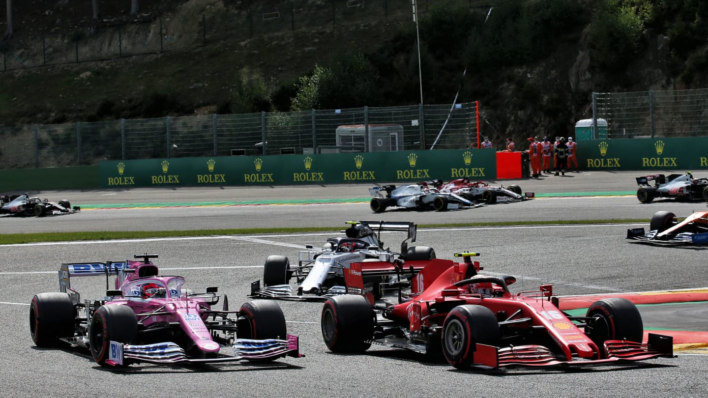 Sergio Perez (MEX) Racing Point F1 Team RP19 and Charles Leclerc (MON) Ferrari SF1000 battle for