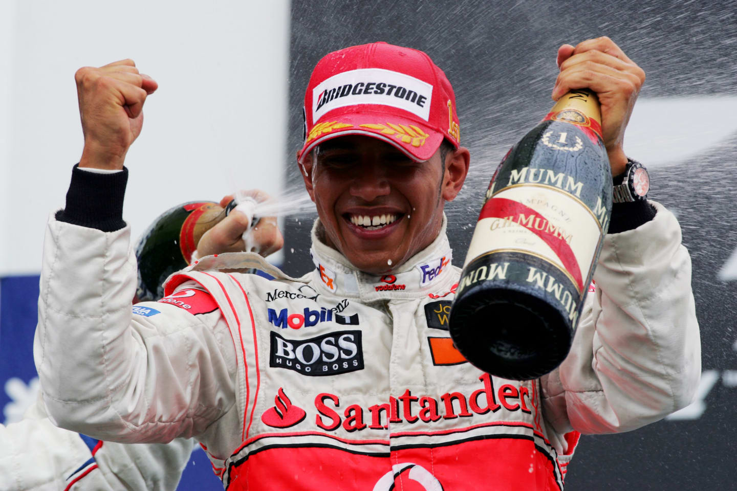 Race winner Lewis Hamilton (GBR) McLaren celebrates on the podium.
Formula One World Championship,