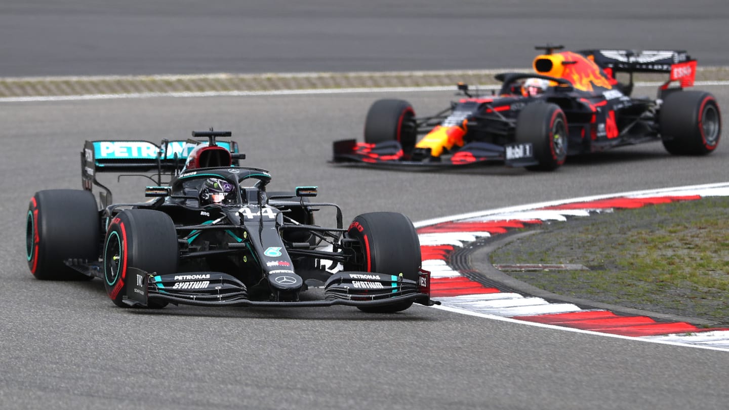 Mercedes driver Lewis Hamilton of Britain leads Red Bull driver Max Verstappen of the Netherlands
