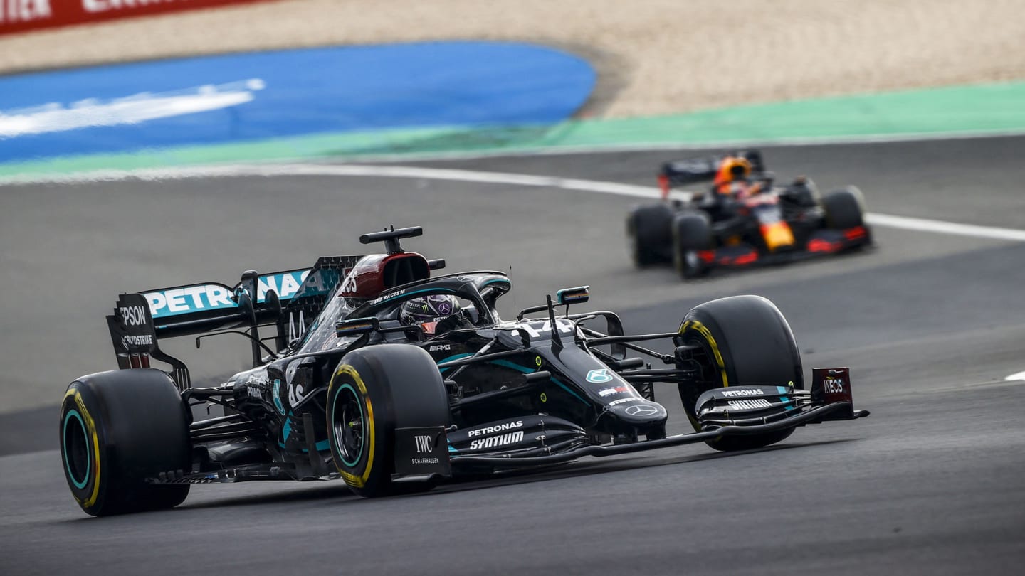 Lewis Hamilton, Mercedes F1 W11 EQ Performance, leads Max Verstappen, Red Bull Racing
