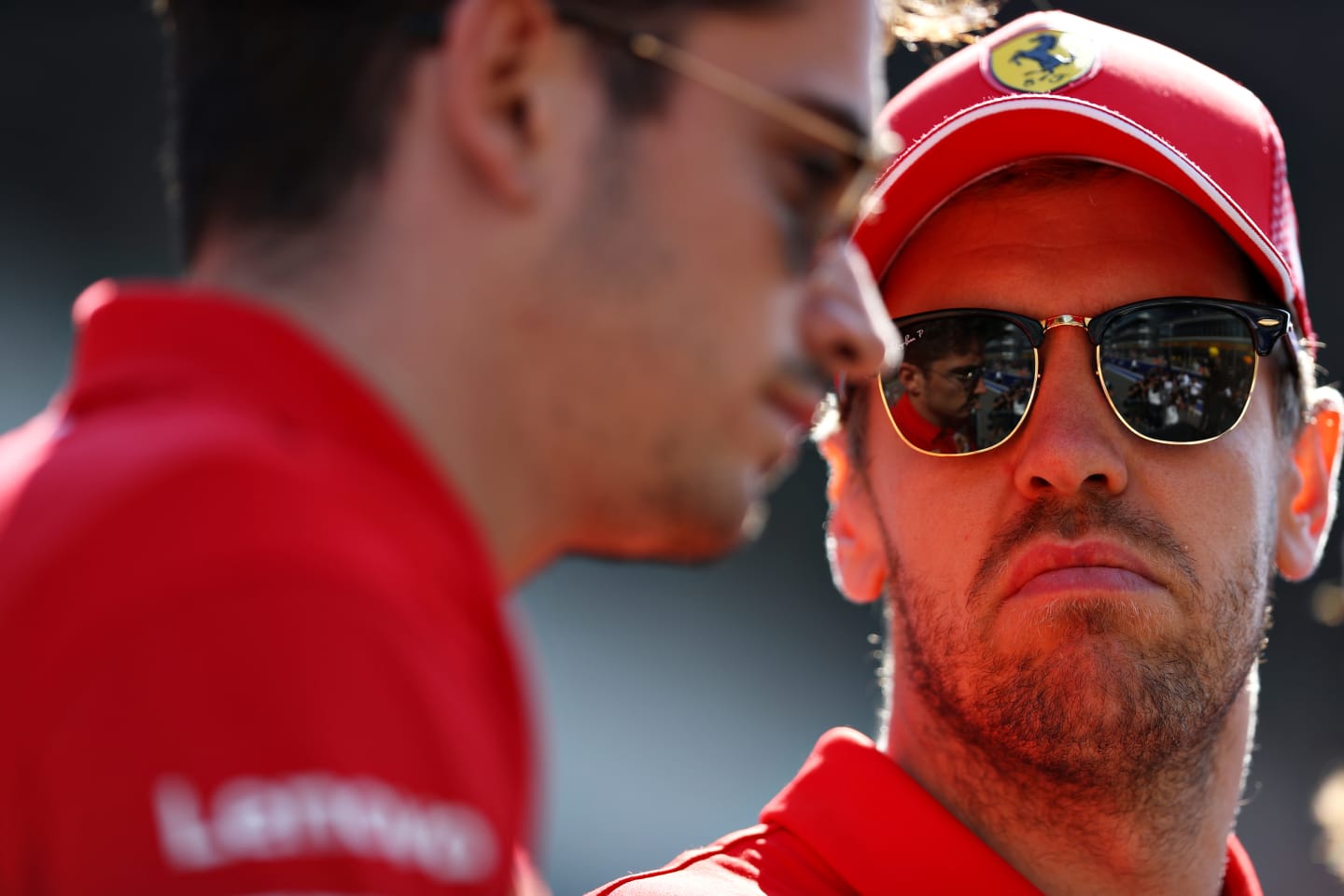 SOCHI, RUSSIA - SEPTEMBER 29: Charles Leclerc of Monaco and Ferrari and Sebastian Vettel of Germany