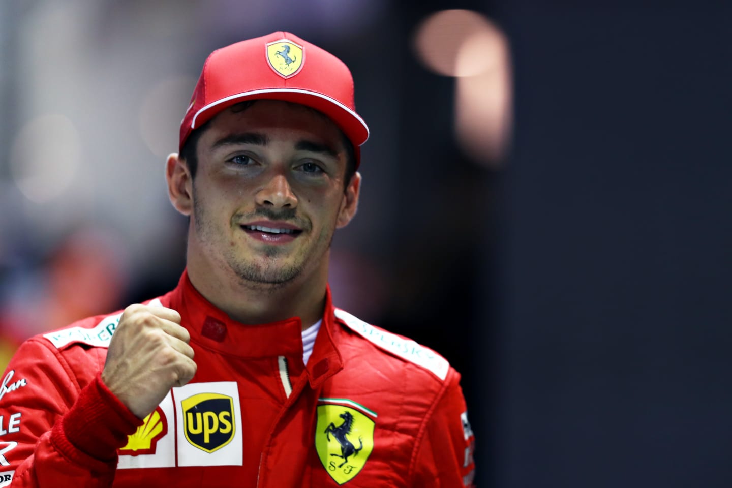 SINGAPORE, SINGAPORE - SEPTEMBER 21: Pole position qualifier Charles Leclerc of Monaco and Ferrari celebrates in parc ferme during qualifying for the F1 Grand Prix of Singapore at Marina Bay Street Circuit on September 21, 2019 in Singapore. (Photo by Mark Thompson/Getty Images)