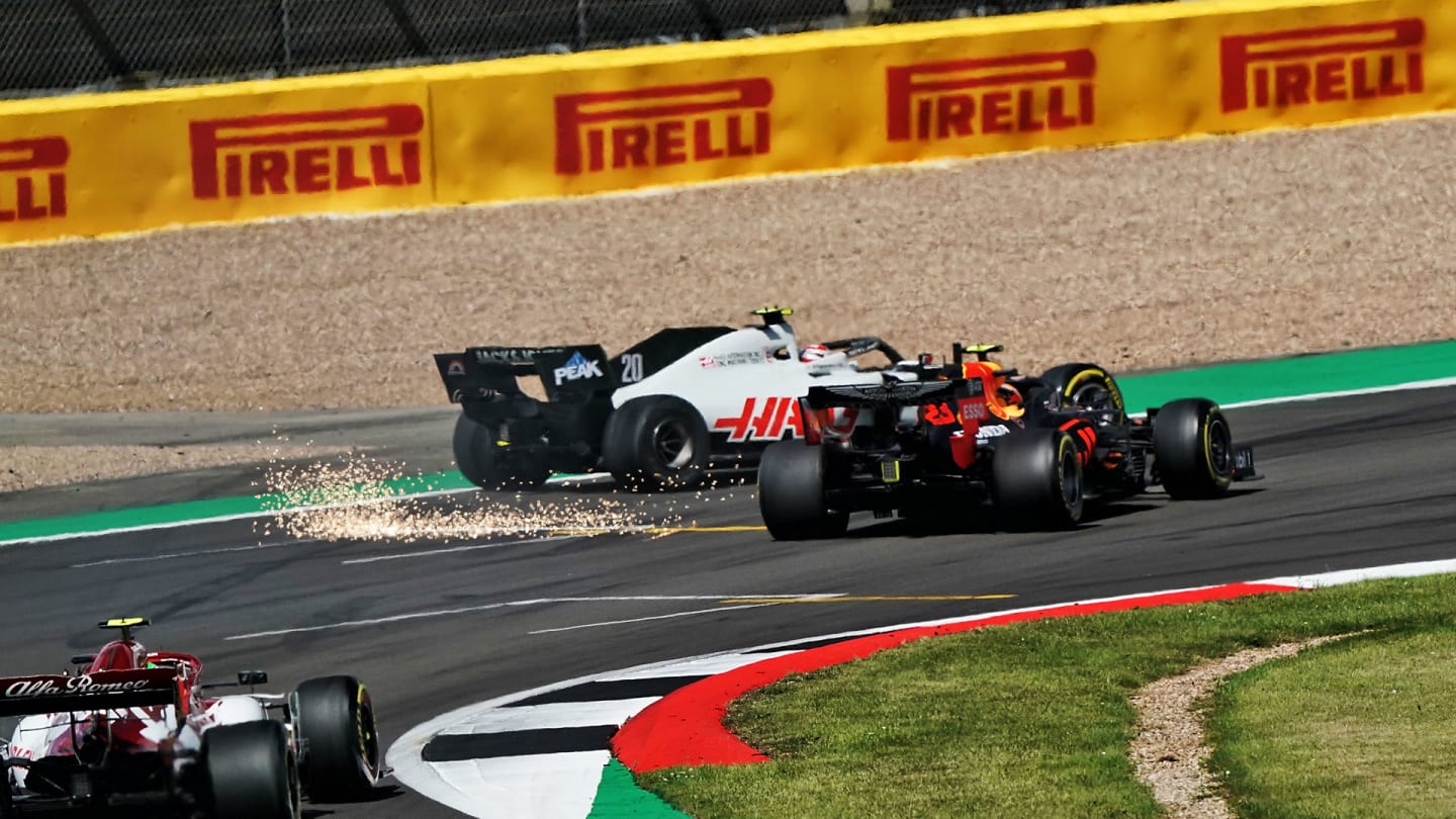Kevin Magnussen (DEN) Haas VF-20 and Alexander Albon (THA) Red Bull Racing RB16 collide.           
