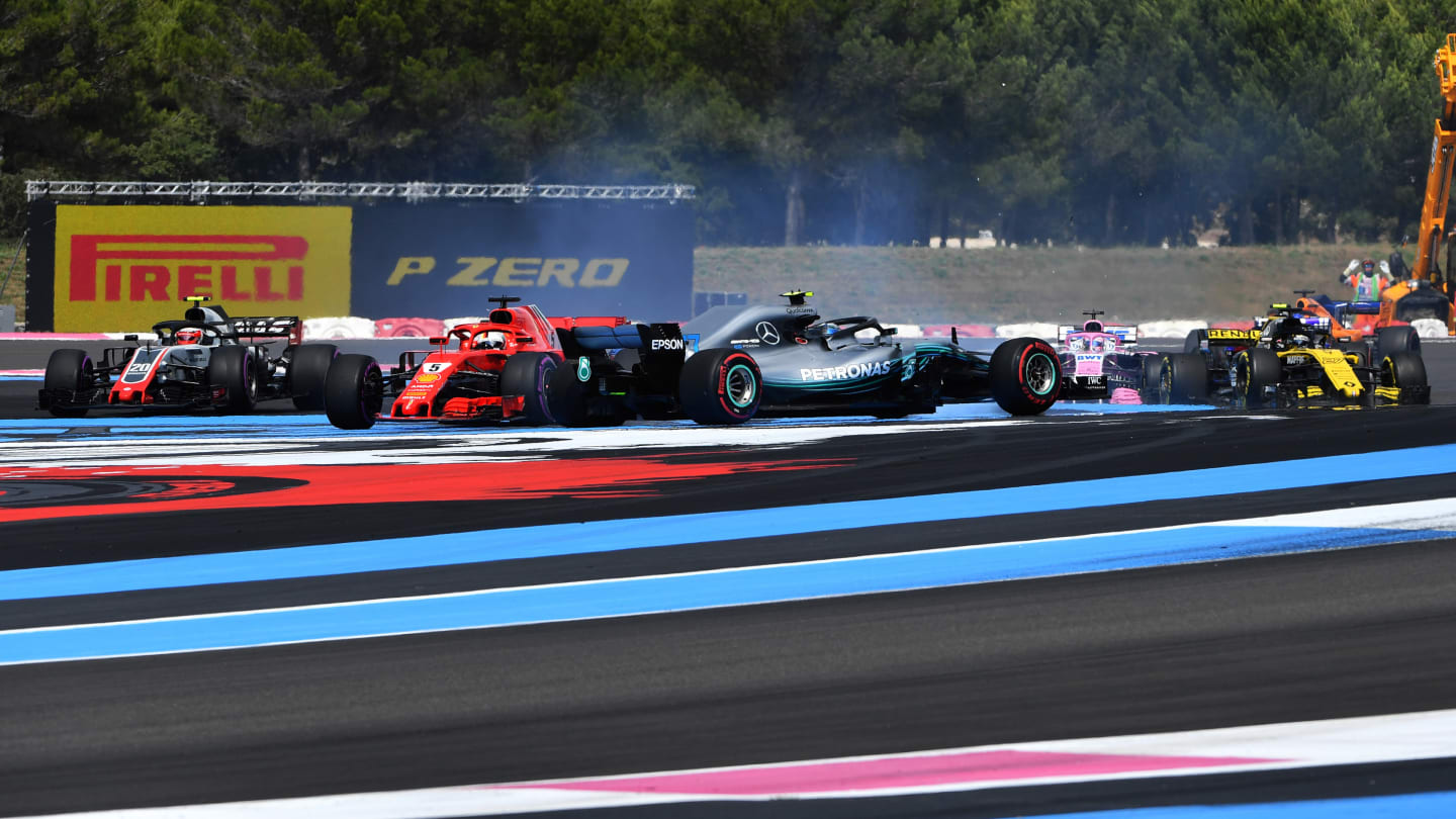 CIRCUIT PAUL RICARD, FRANCE - JUNE 24: Sebastian Vettel (GER) Ferrari SF-71H hits Valtteri Bottas