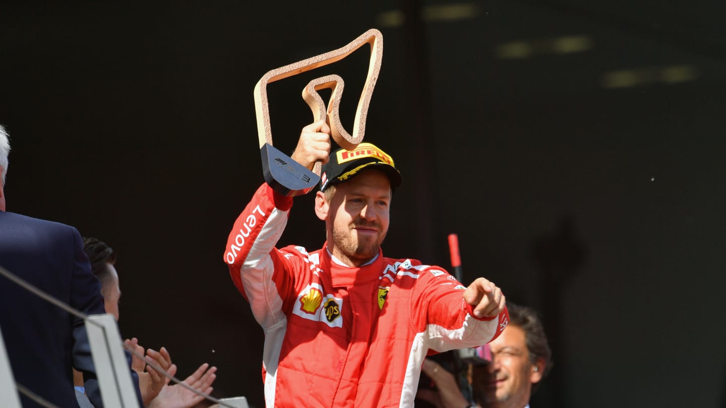 RED BULL RING, AUSTRIA - JULY 01: Sebastian Vettel (GER) Ferrari celebrates on the podium with the