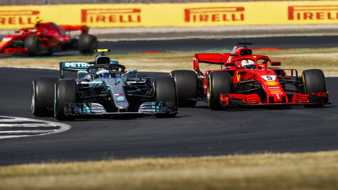 SILVERSTONE, UNITED KINGDOM - JULY 08: Valtteri Bottas, Mercedes AMG F1 W09, battles with Sebastian