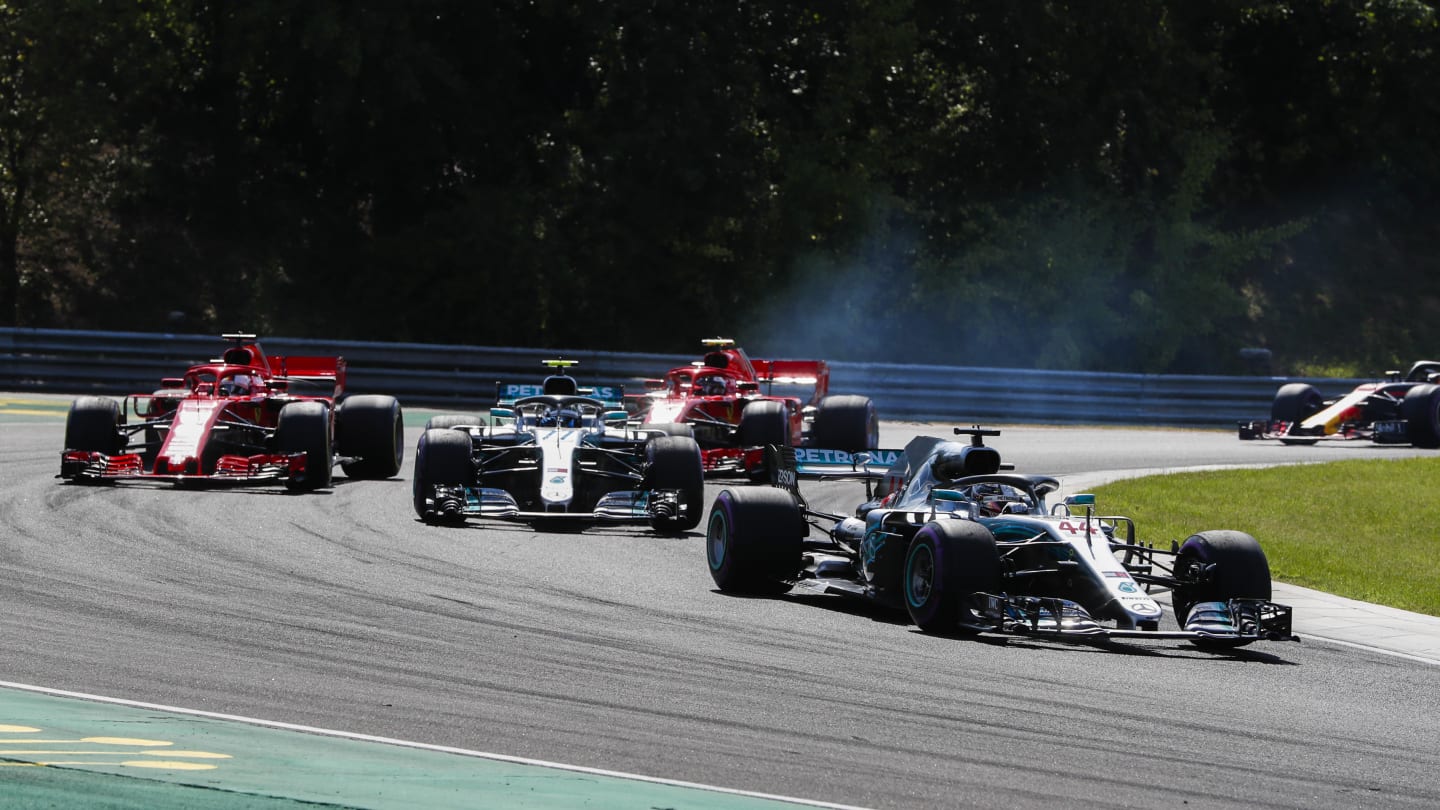 HUNGARORING, HUNGARY - JULY 29: Lewis Hamilton, Mercedes AMG F1 W09, leads Valtteri Bottas,