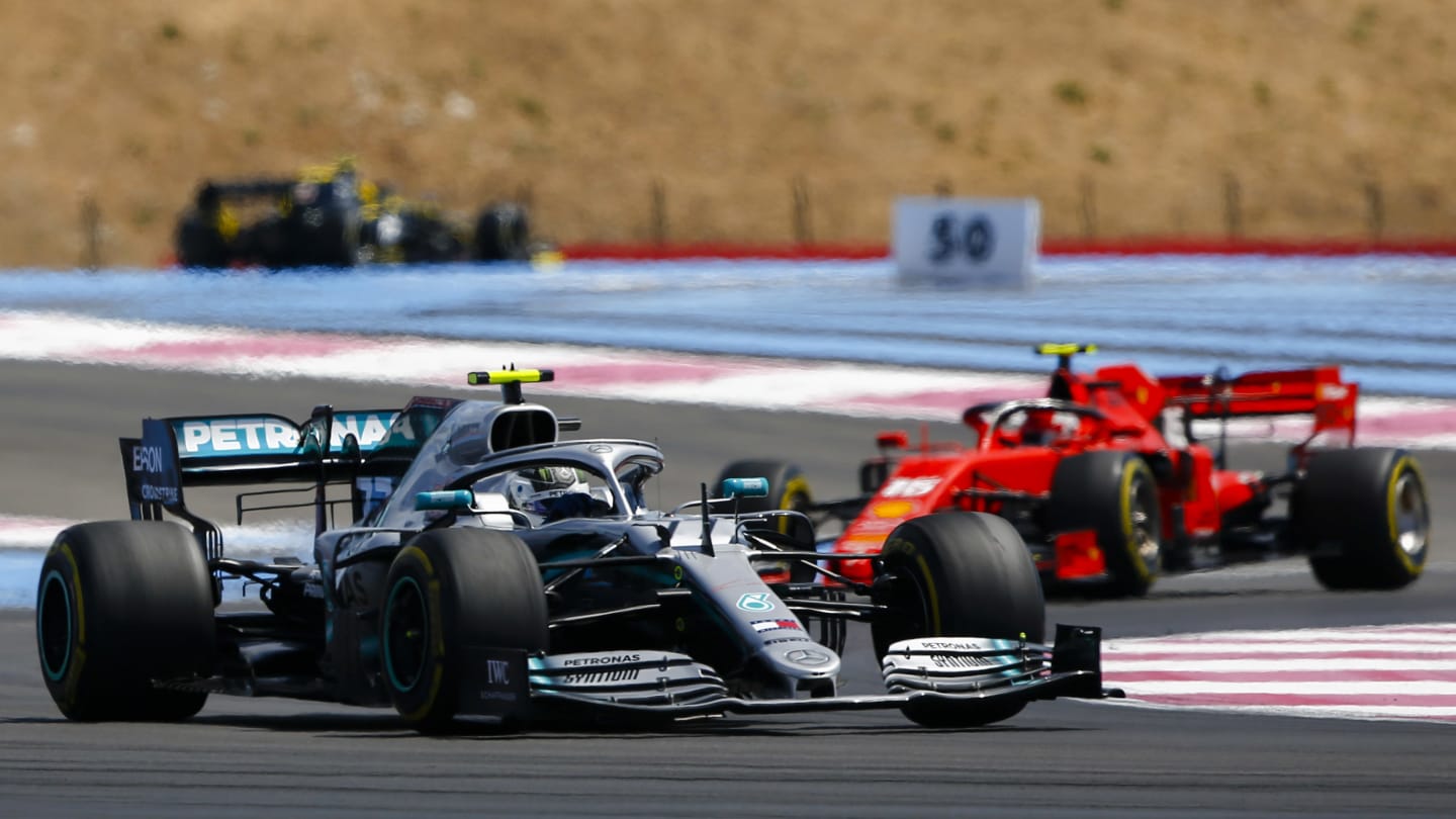 CIRCUIT PAUL RICARD, FRANCE - JUNE 23: Valtteri Bottas, Mercedes AMG W10 leads Charles Leclerc,