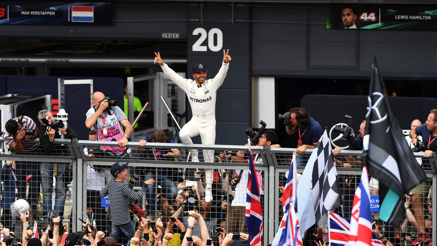 www.sutton-images.com

Race winner Lewis Hamilton (GBR) Mercedes AMG F1 celebrates with the fans at