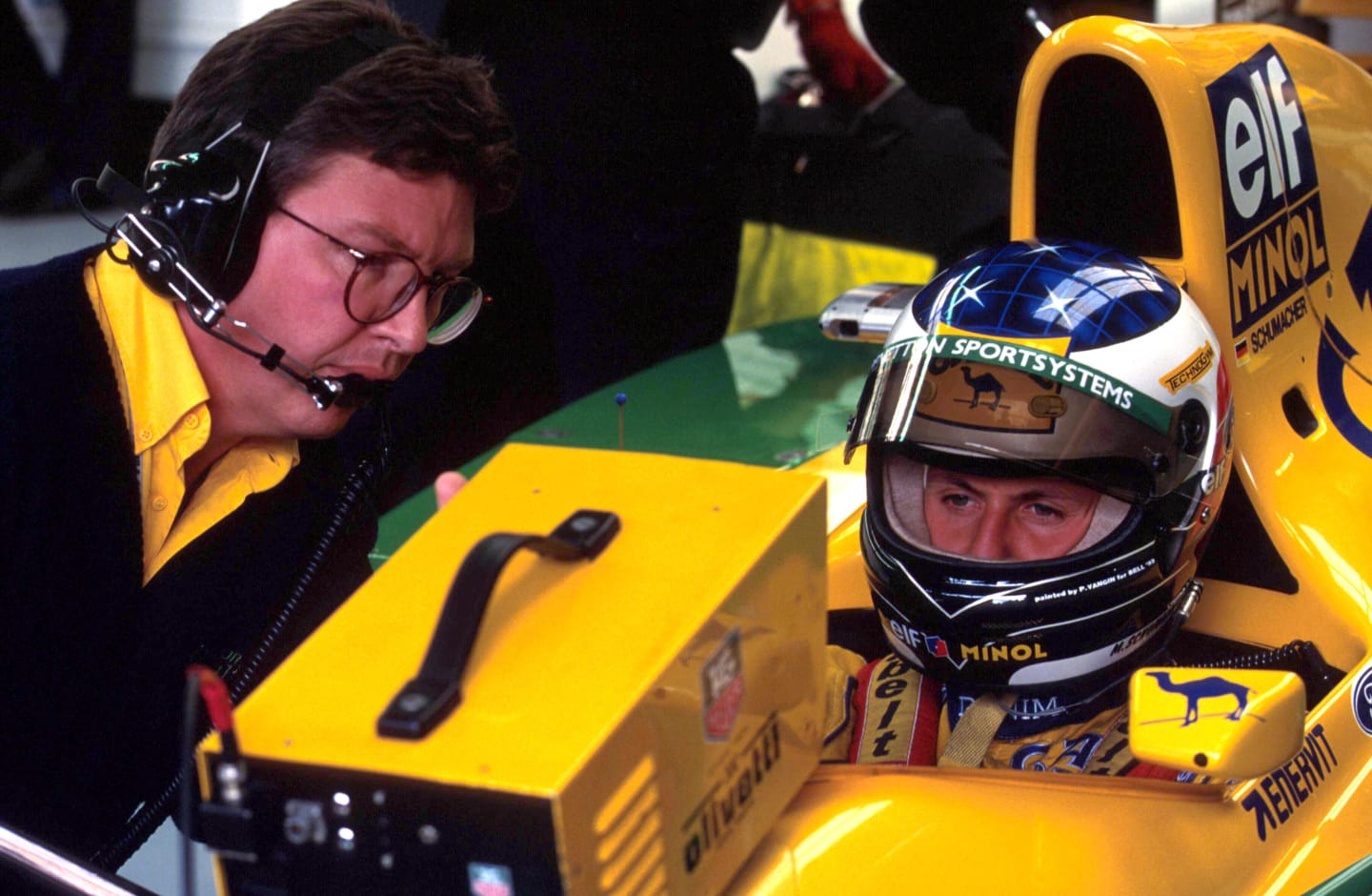 Michael Schumacher (GER) watches the qualifying times with Ross Brawn (GBR)
Belgian Grand Prix,