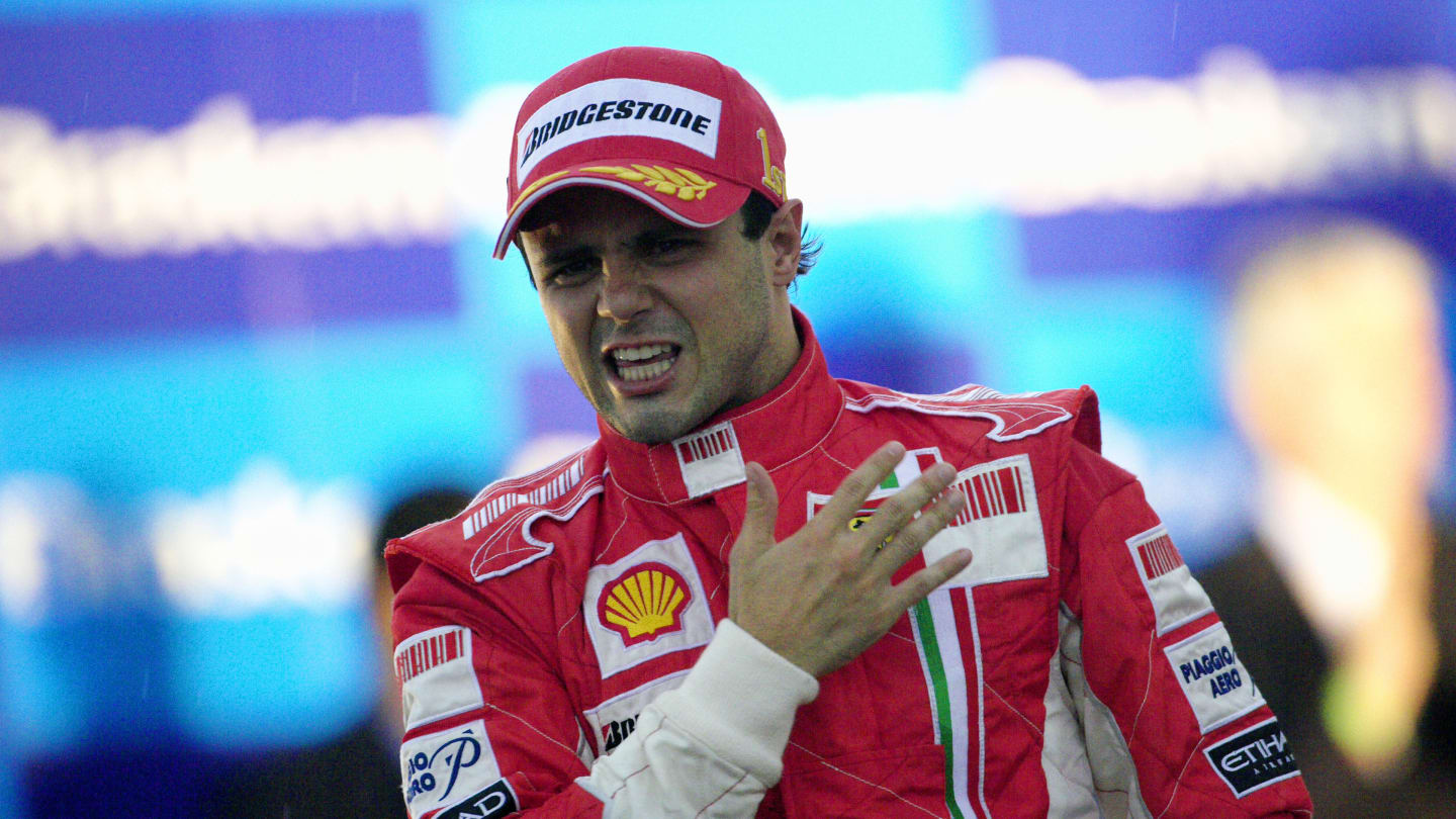 AUTÃ Â³DROMO JOSÃ Â© CARLOS PACE, BRAZIL - NOVEMBER 02: An emotional Felipe Massa proudly slaps the