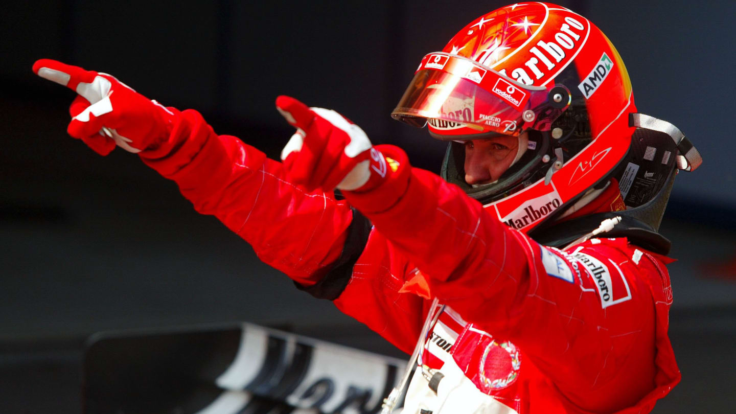 Race winner Michael Schumacher (GER) Ferrari celebrates in Parc Ferme.
Formula One World