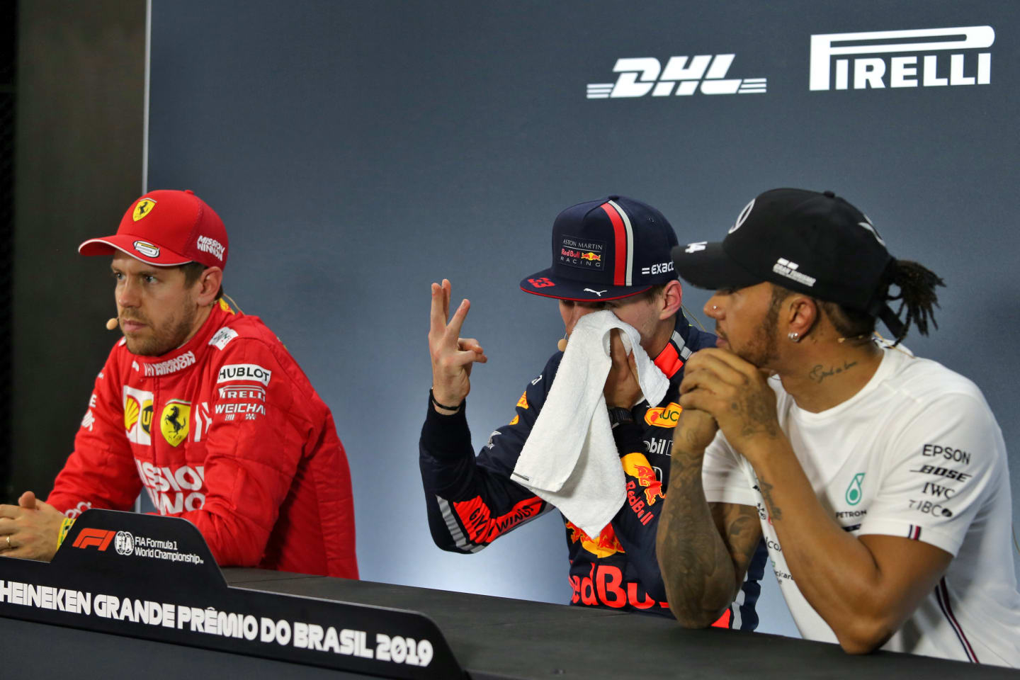(L to R): Sebastian Vettel (GER) Ferrari; Max Verstappen (NLD) Red Bull Racing; and Lewis Hamilton