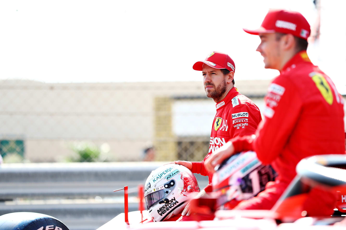 ABU DHABI, UNITED ARAB EMIRATES - NOVEMBER 30: Sebastian Vettel of Germany and Ferrari and Charles