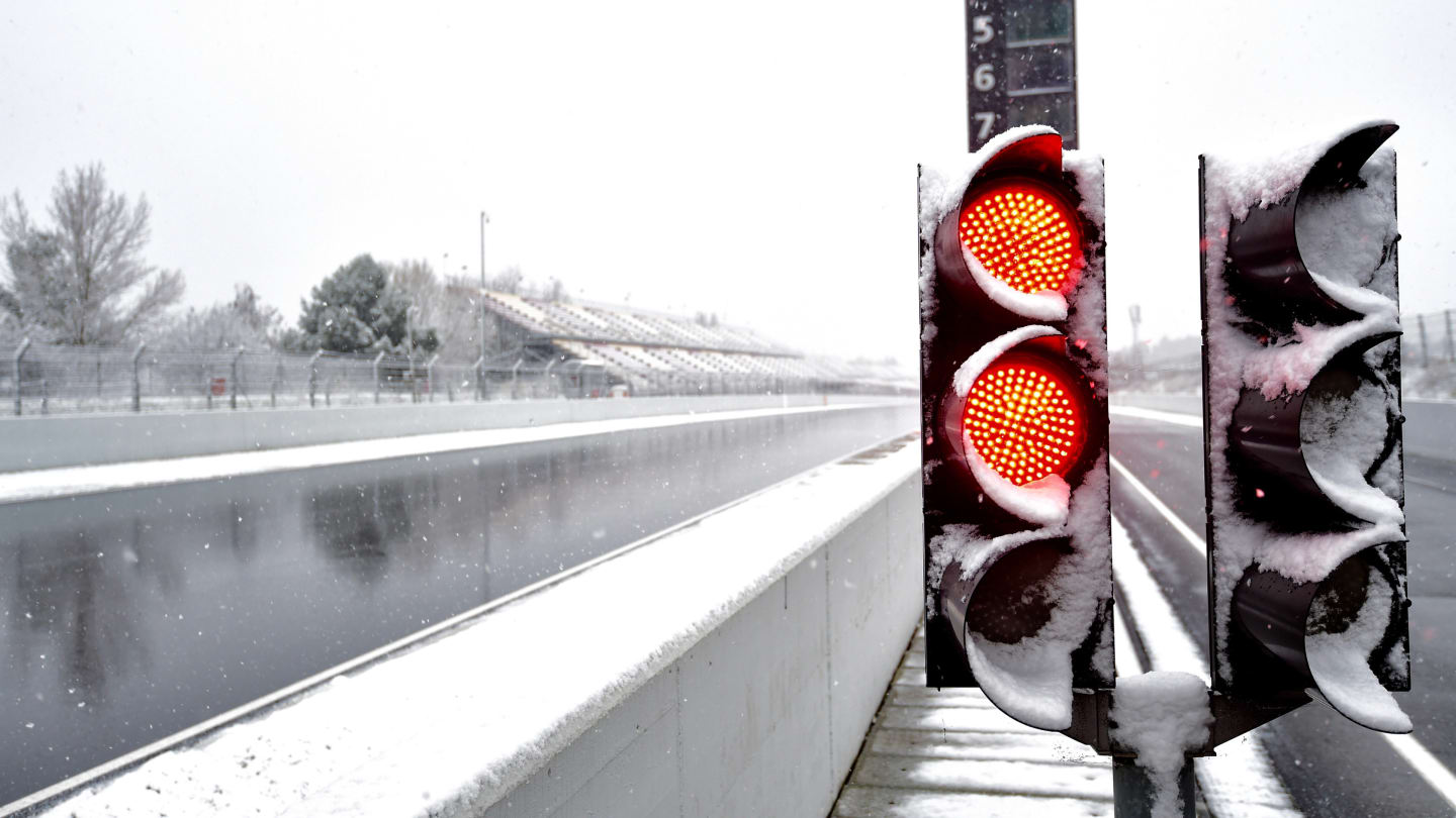 Red light in pit lane as snow stops testing at Formula One Testing, Day Three, Barcelona, Spain, 28