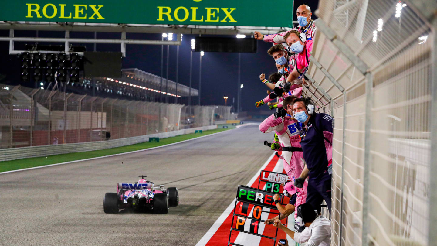 Sergio Perez, Racing Point RP20, crosses the finish line to take the race