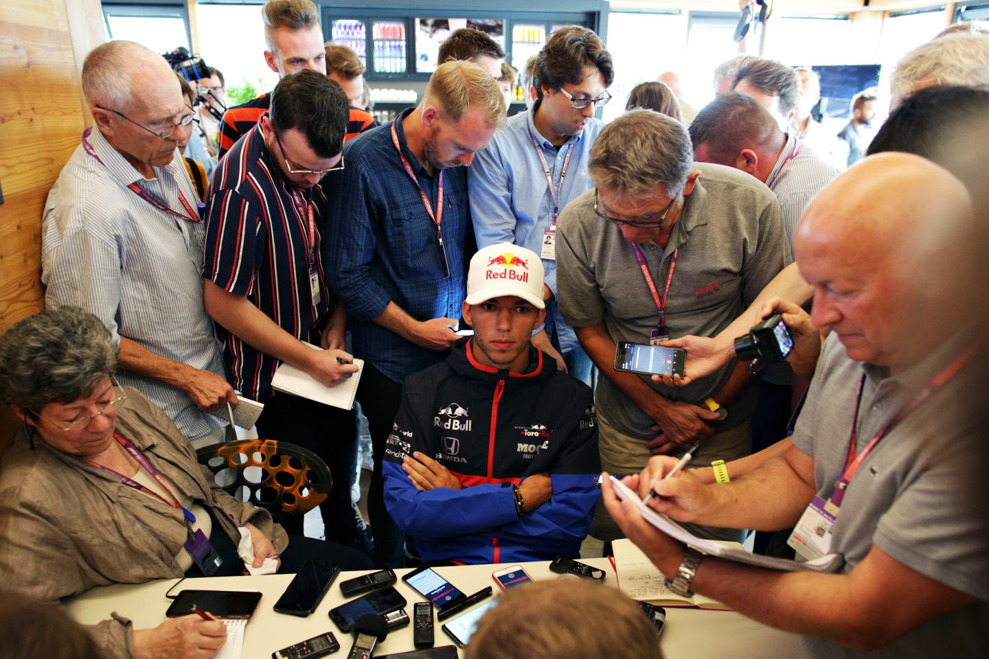 SPA, BELGIUM - AUGUST 29: Pierre Gasly of France and Scuderia Toro Rosso talks to the media in the