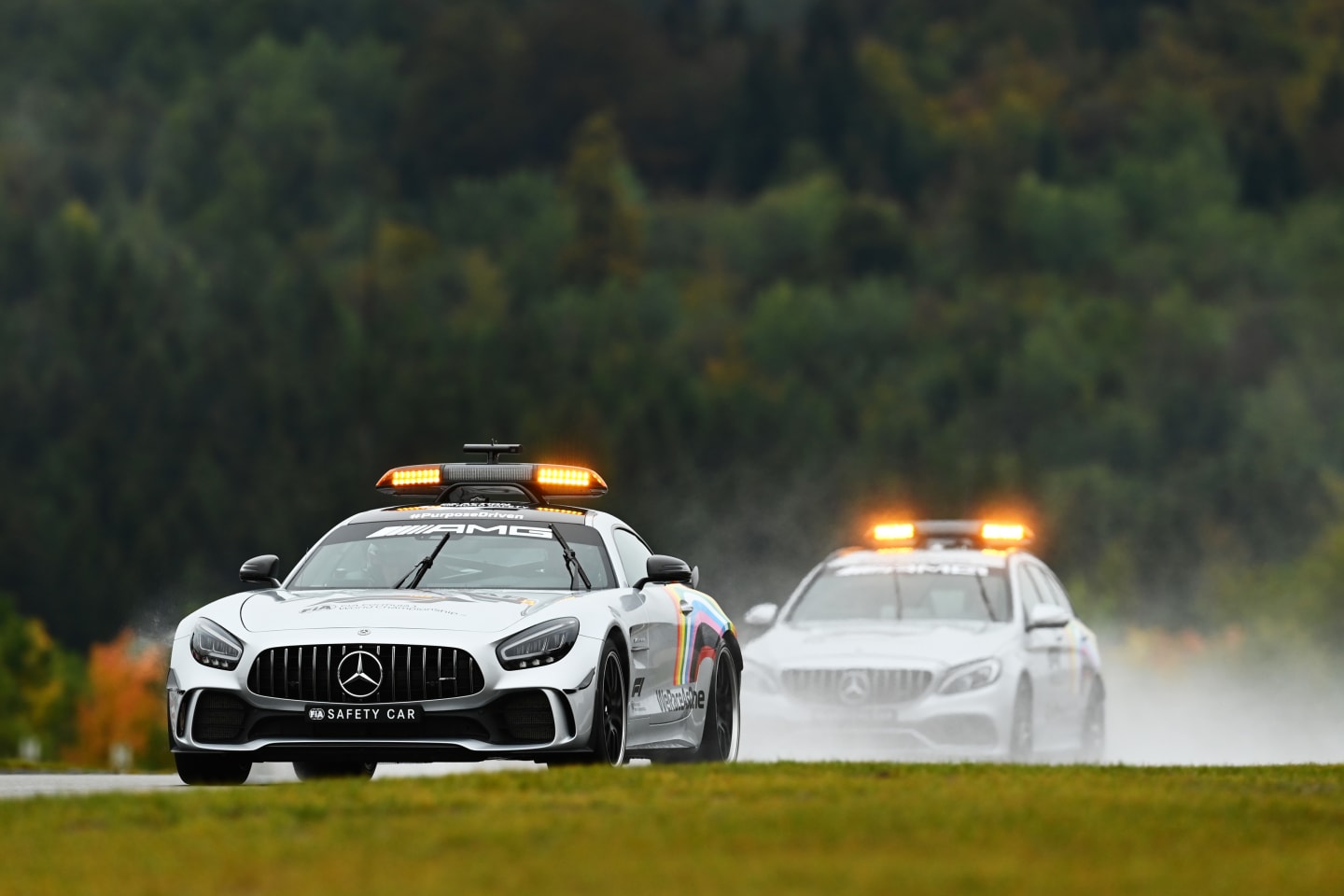 NUERBURG, GERMANY - OCTOBER 09: The FIA Safety Car and FIA Medical Car do a lap on track before