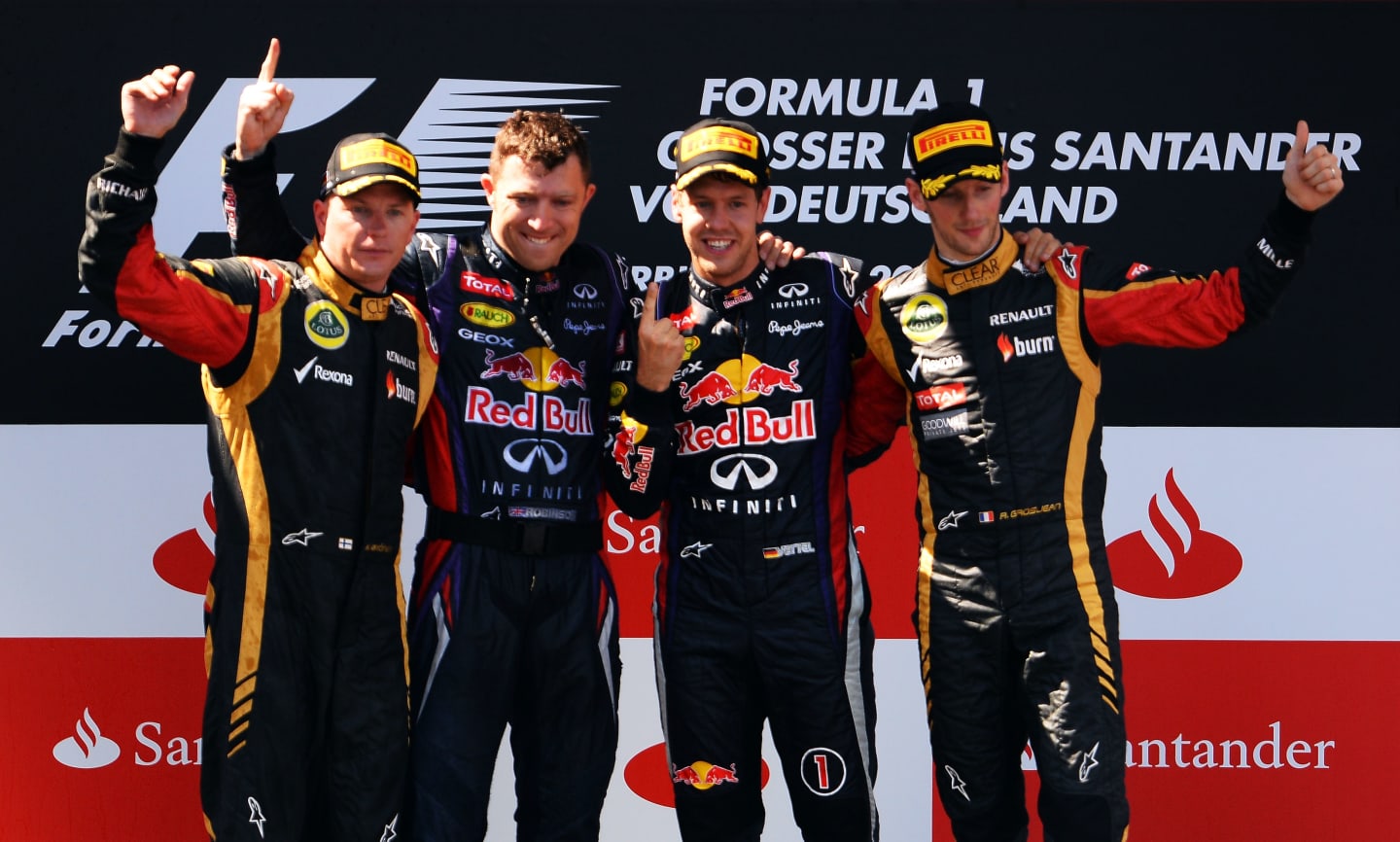 NUERBURG, GERMANY - JULY 07:  Race winner Sebastian Vettel (2nd right) of Germany and Infiniti Red