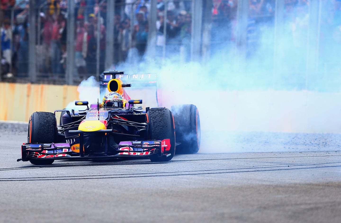 SAO PAULO, BRAZIL - NOVEMBER 24:  Sebastian Vettel of Germany and Infiniti Red Bull Racing performs