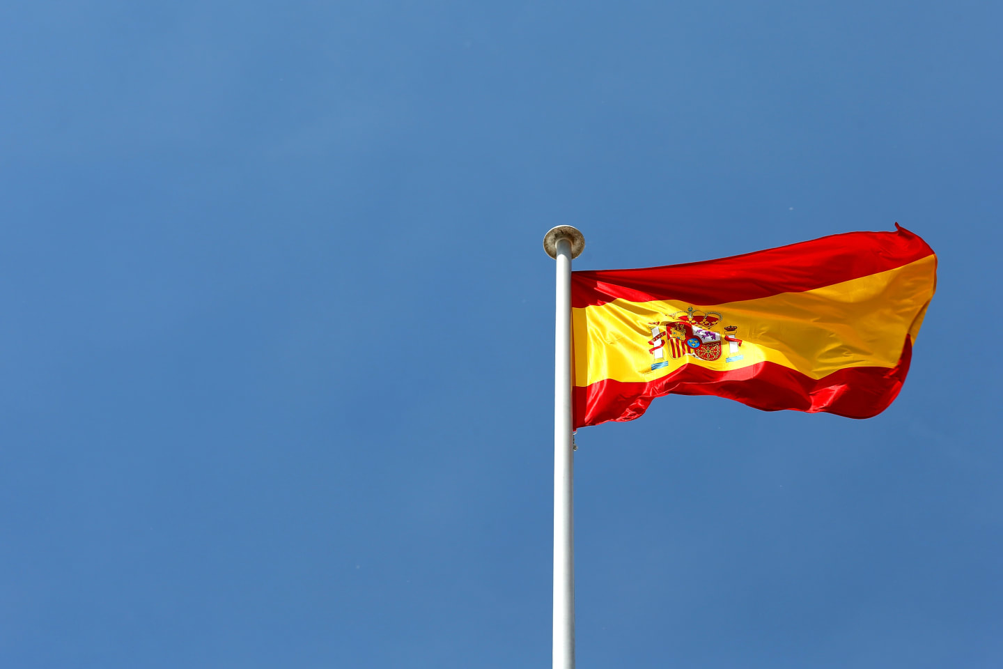 MONTMELO, SPAIN - MAY 08:  The Spanish national flag flies above the circuit ahead of the Spanish