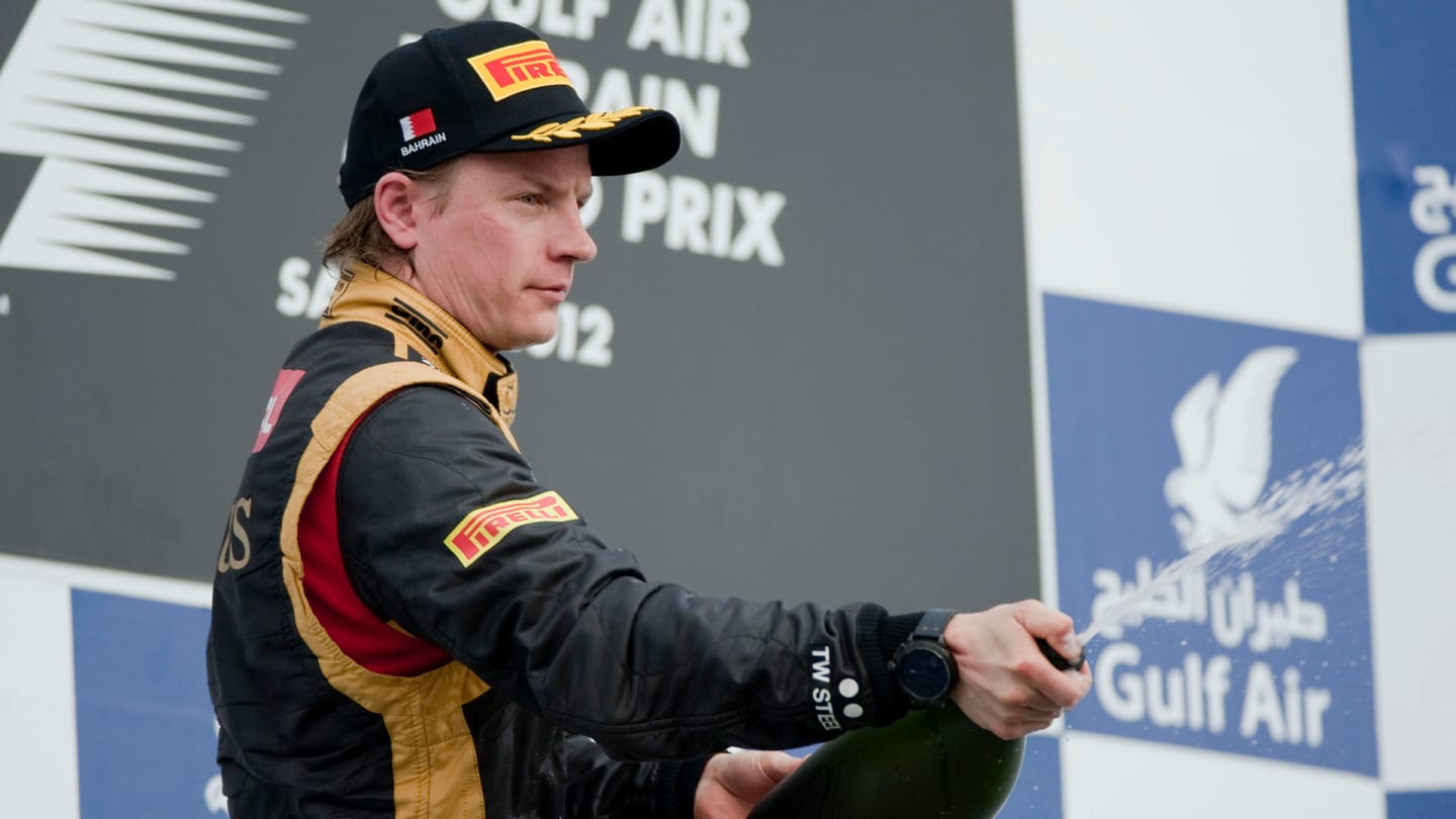 SAKHIR, BAHRAIN - APRIL 22:  Kimi Raikkonen of Finland and Lotus celebrates 2nd place during the