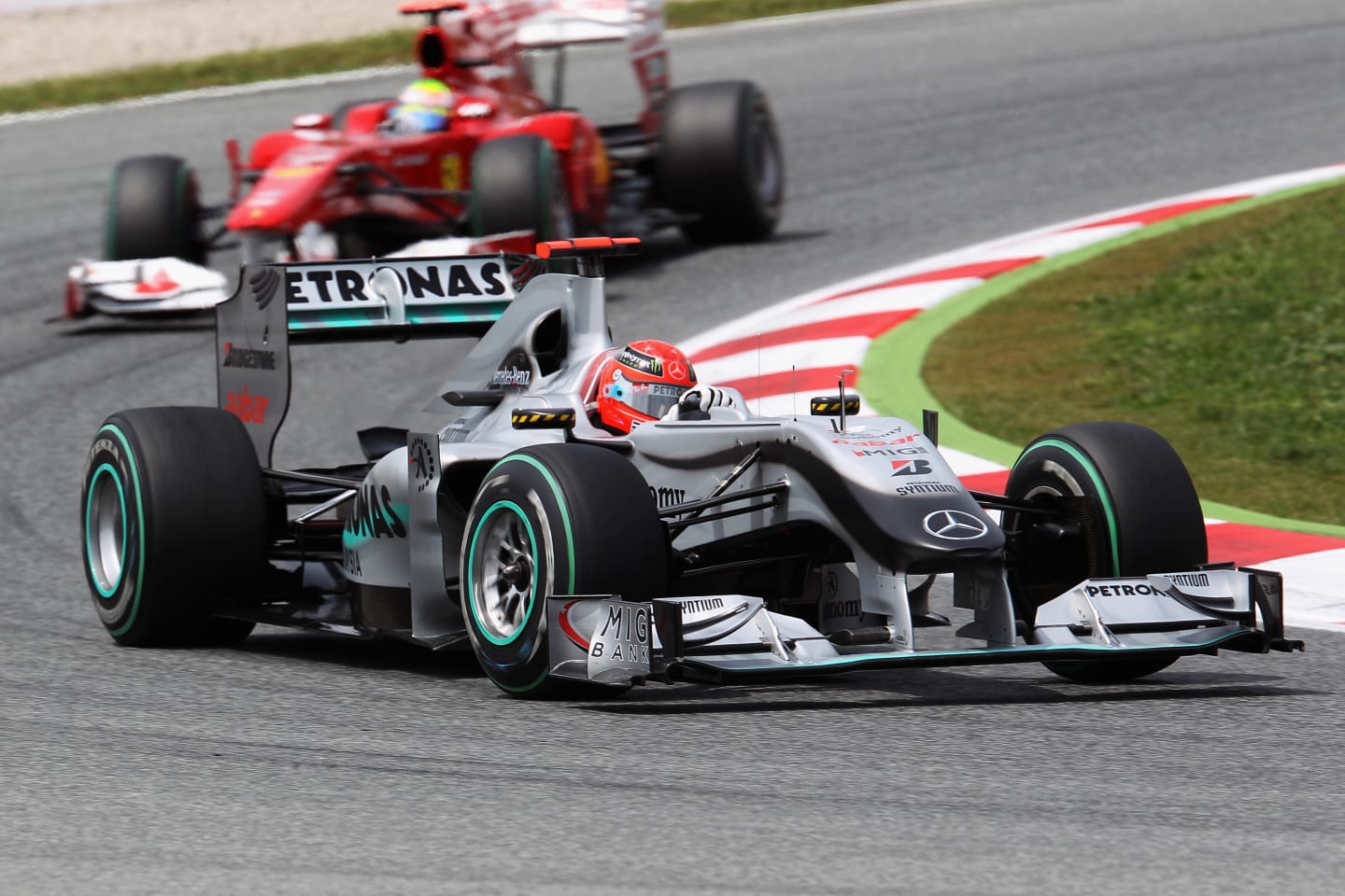BARCELONA, SPAIN - MAY 09:  Michael Schumacher of Germany and Mercedes GP leads from Felipe Massa