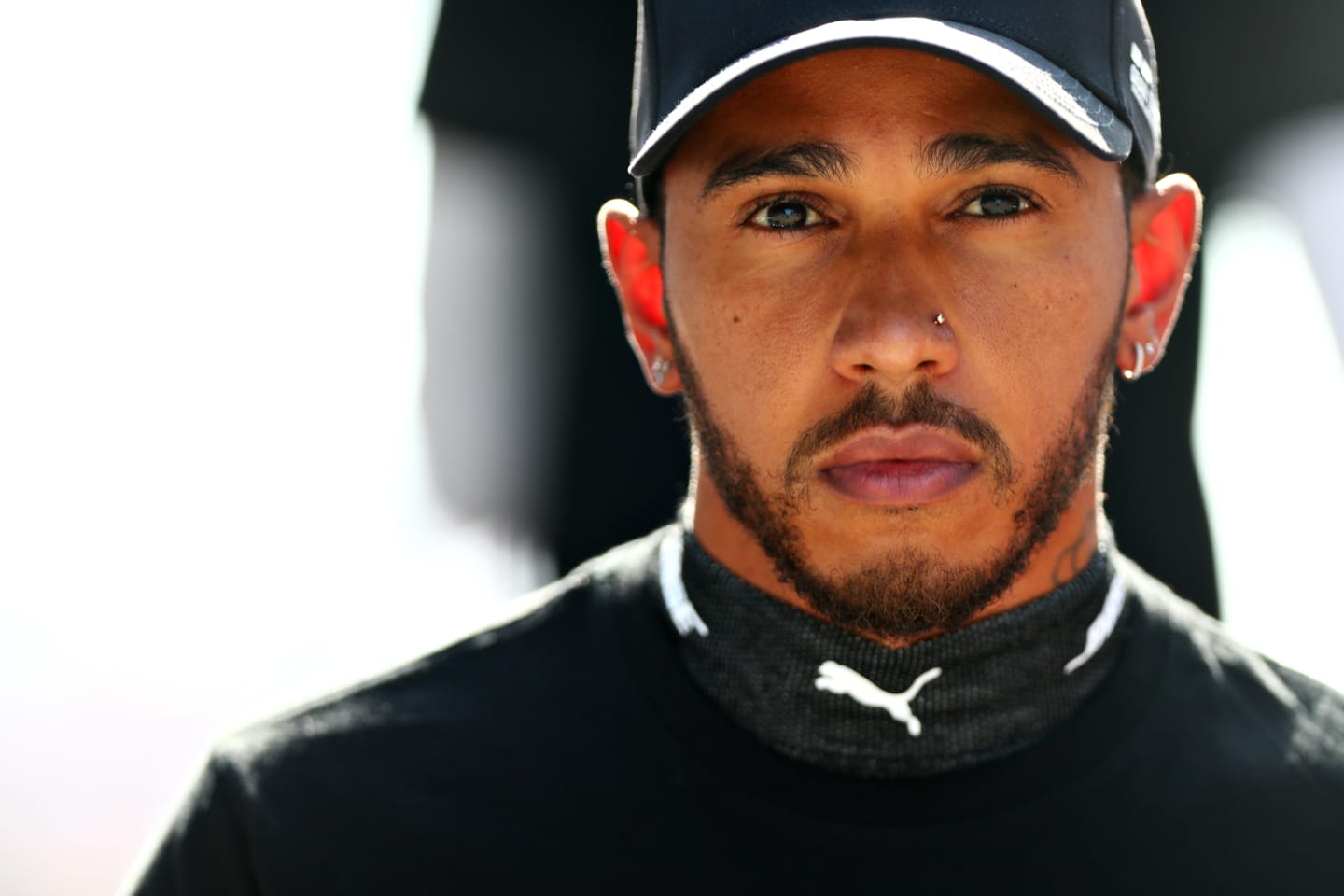 SOCHI, RUSSIA - SEPTEMBER 27: Lewis Hamilton of Great Britain and Mercedes GP looks on before the