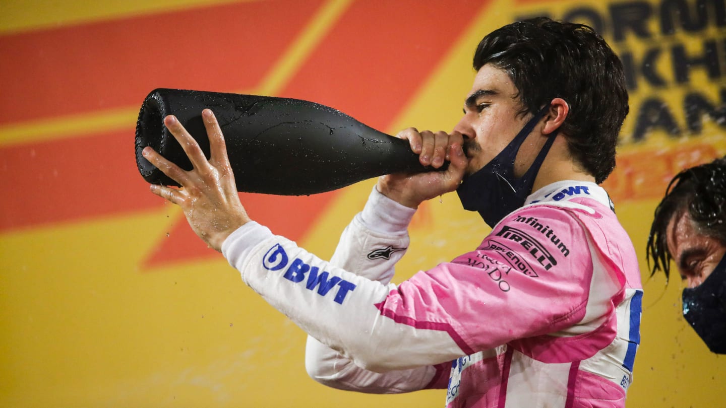 Lance Stroll, Racing Point, 3rd position, drinks rose water on the