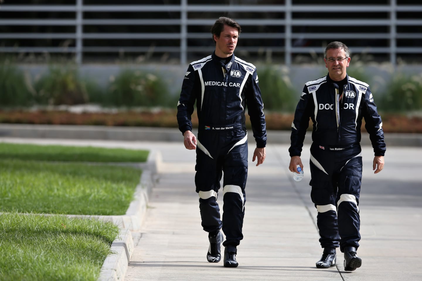 BAHRAIN, BAHRAIN - APRIL 08: FIA Safety Car driver Alan van der Merwe and FIA Doctor Ian Robertson