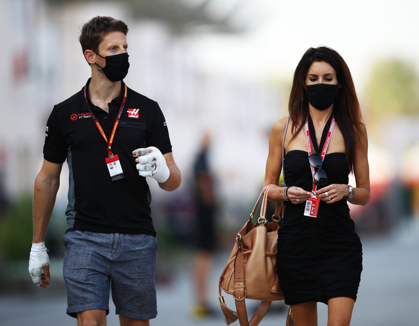 BAHRAIN, BAHRAIN - DECEMBER 05: Romain Grosjean of France and Haas F1 walks in the Paddock with his
