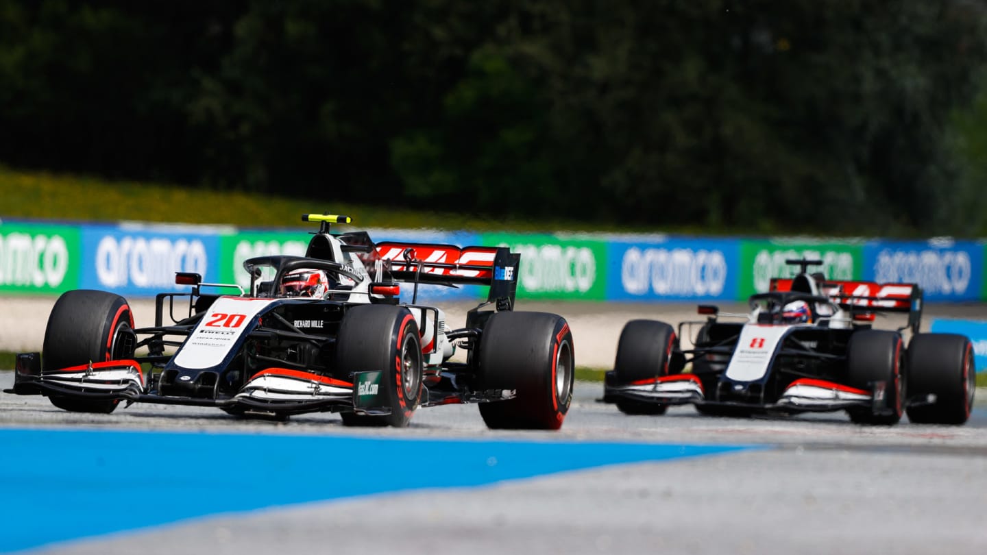 RED BULL RING, AUSTRIA - JULY 12: Kevin Magnussen, Haas VF-20, leads Romain Grosjean, Haas VF-20