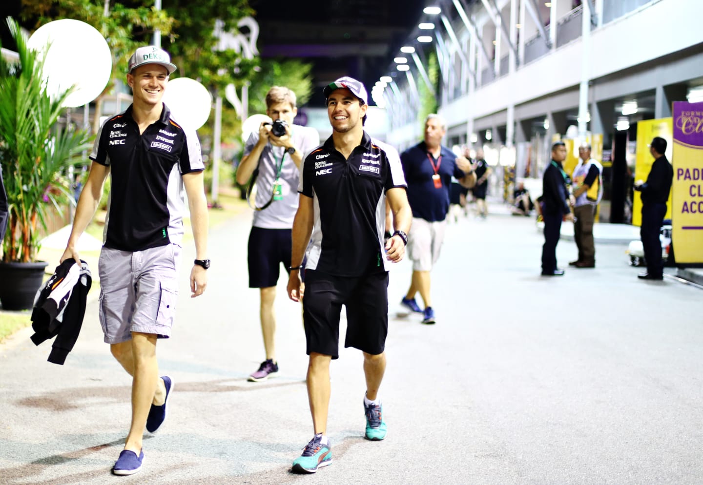 SINGAPORE - SEPTEMBER 15: Nico Hulkenberg of Germany and Force India and Sergio Perez of Mexico and