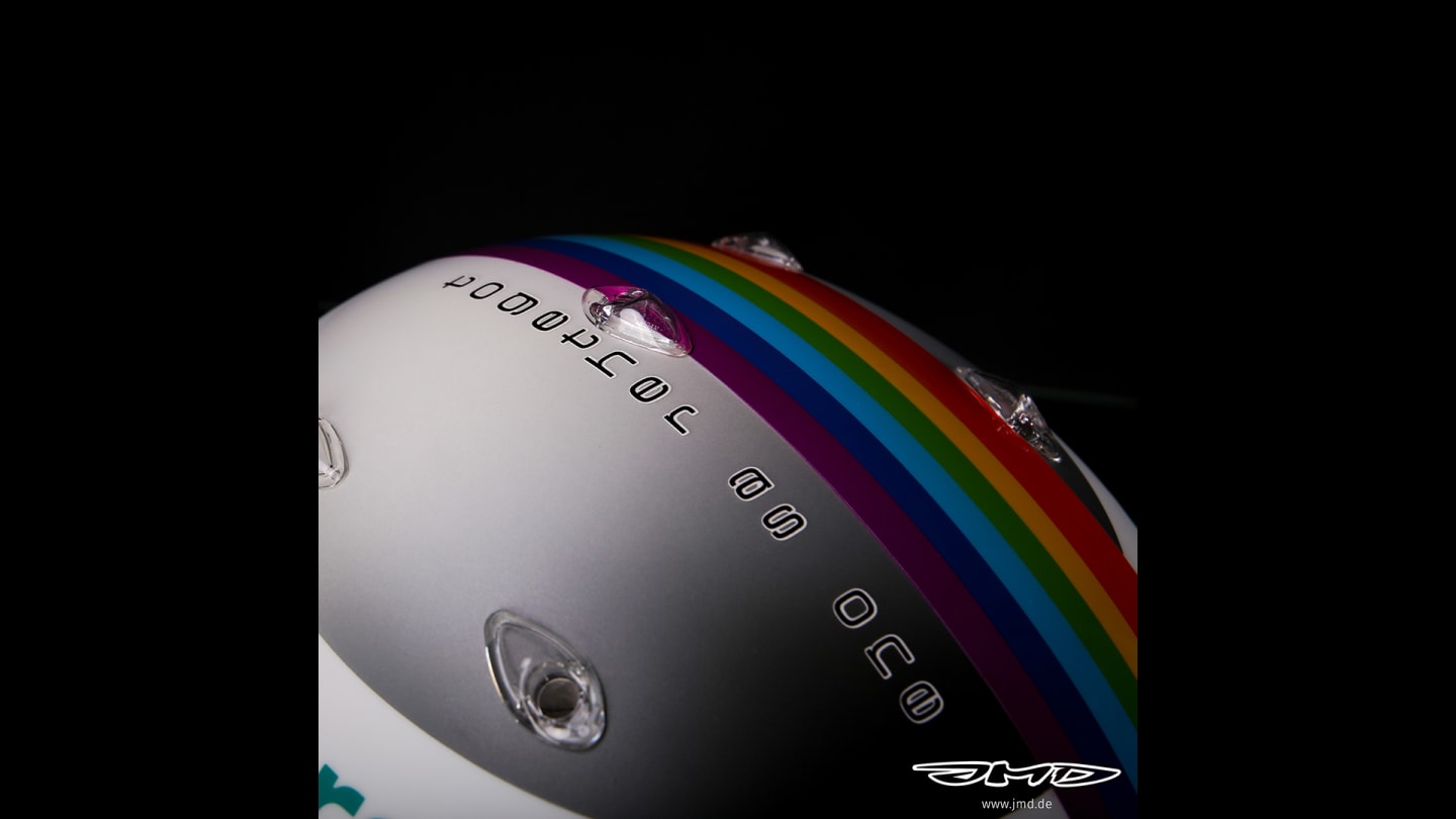 The 'together as one' message on top of Vettel's helmet