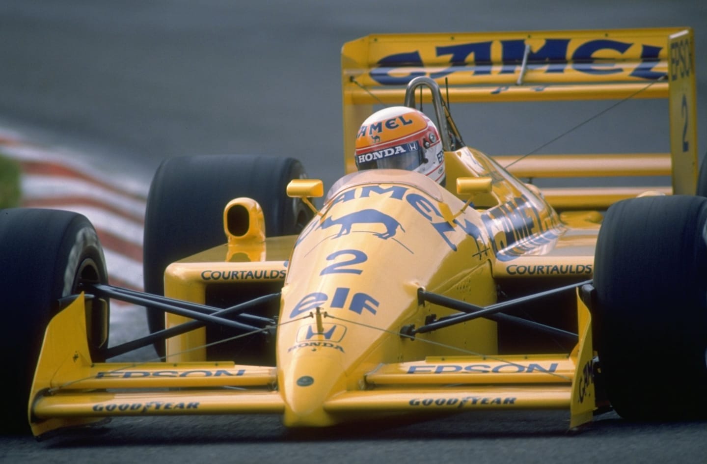 1988:  Satoru Nakajima of Japan cuts close to a corner in his Lotus Honda during the Belgian Grand
