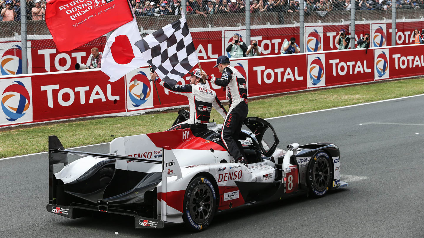 LE MANS, FRANCE - JUNE 16: (L-R) Race winners Fernando Alonso of Spain and Toyota Gazoo Racing and