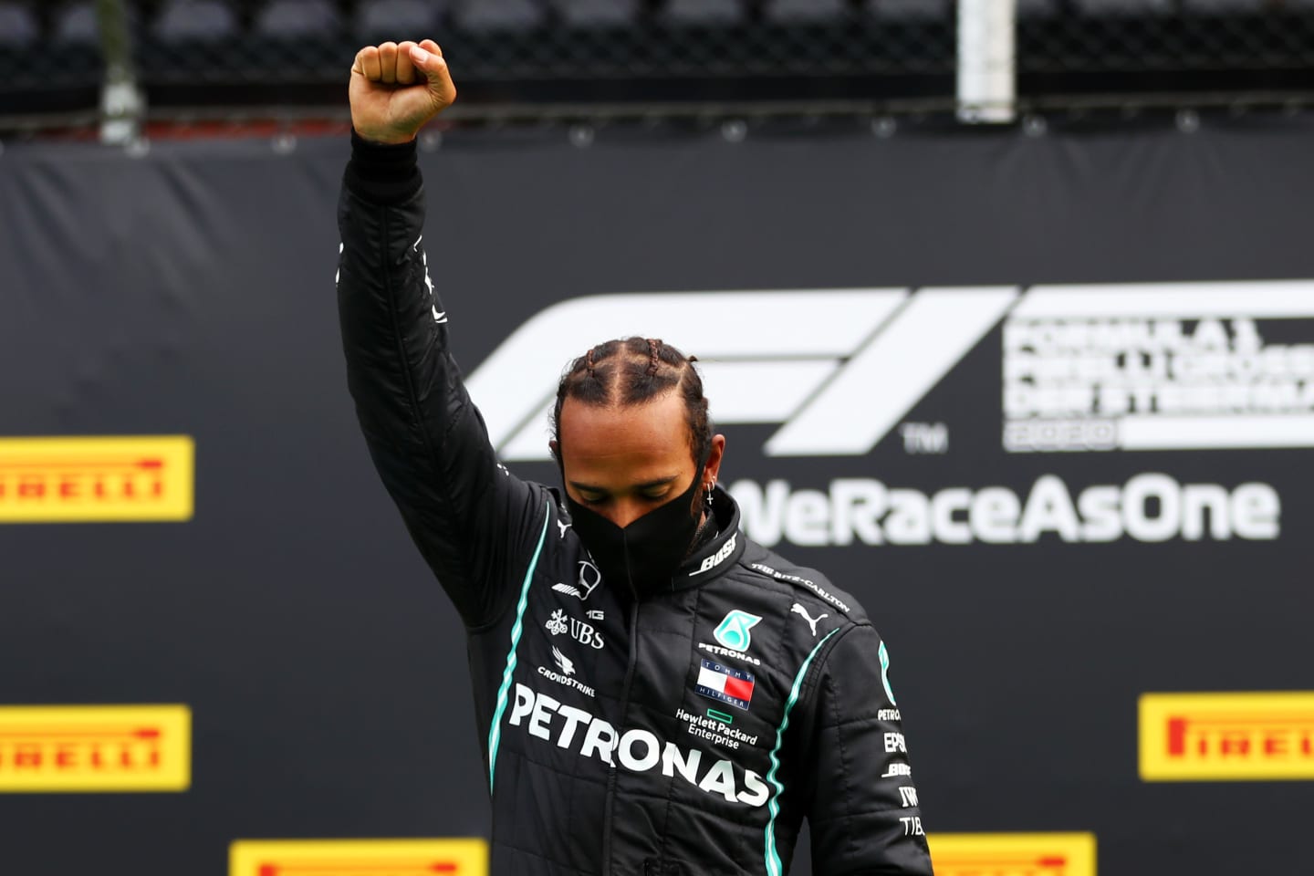 SPIELBERG, AUSTRIA - JULY 12:  Lewis Hamilton of Great Britain and Mercedes GP raises his fist as