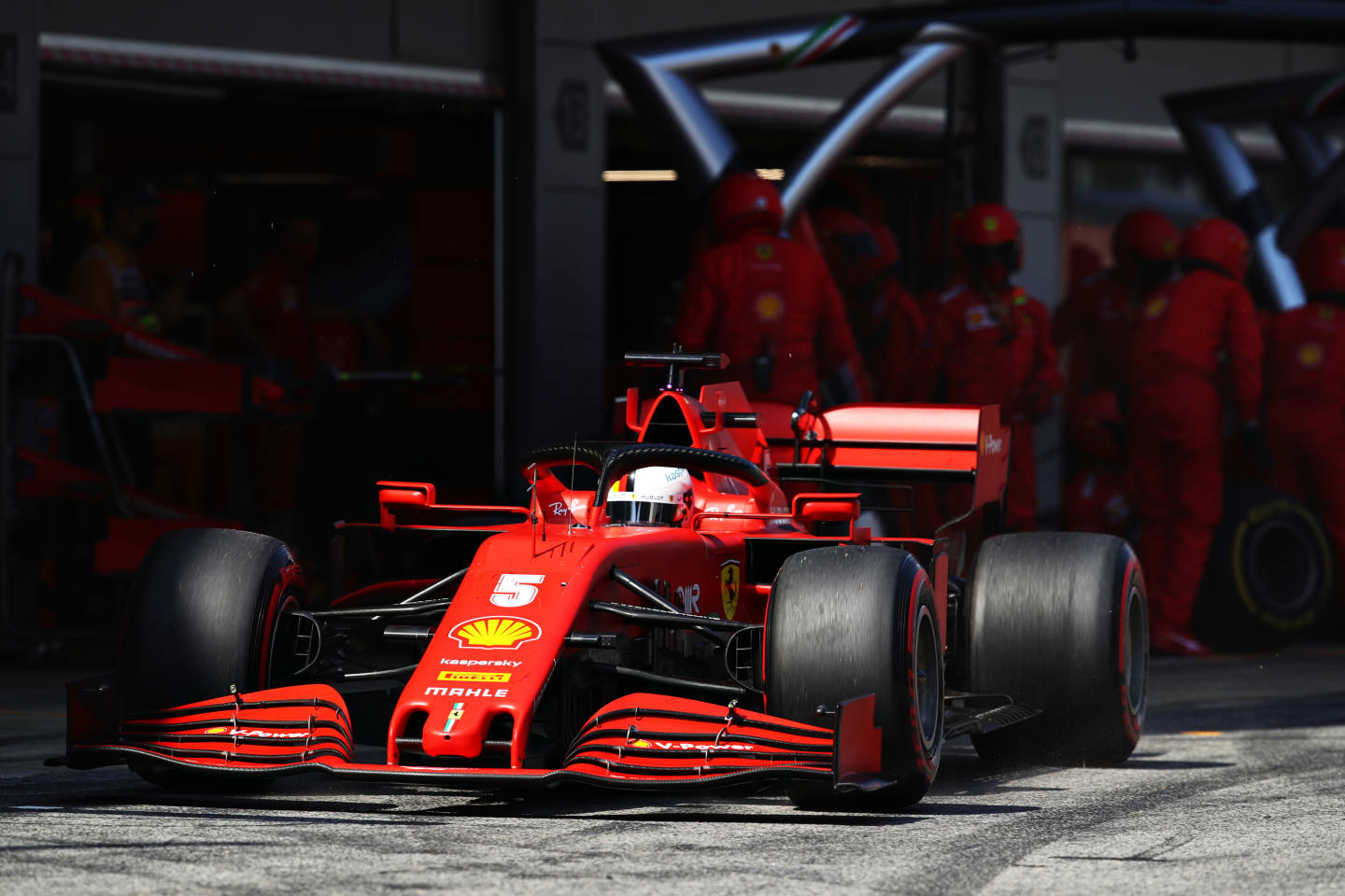 BARCELONA, SPAIN - AUGUST 16: Sebastian Vettel of Germany driving the (5) Scuderia Ferrari SF1000