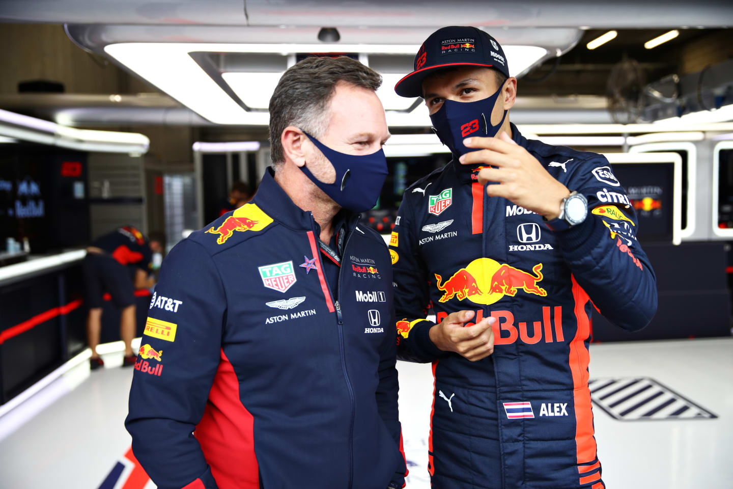 SPA, BELGIUM - AUGUST 29: Red Bull Racing Team Principal Christian Horner speaks with Alexander Albon of Thailand and Red Bull Racing in the garage during qualifying for the F1 Grand Prix of Belgium at Circuit de Spa-Francorchamps on August 29, 2020 in Spa, Belgium. (Photo by Mark Thompson/Getty Images)