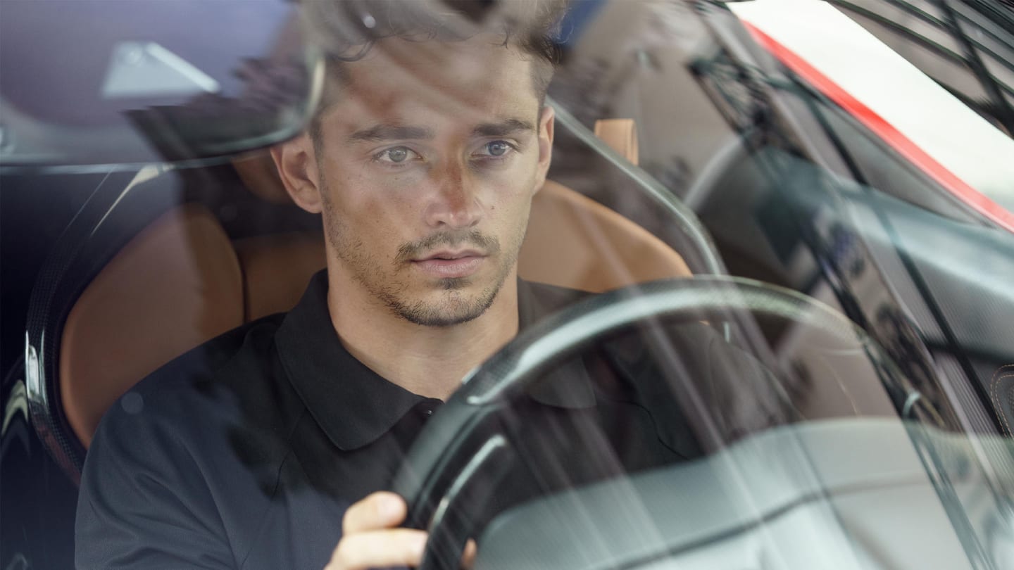 Leclerc gets behind the wheel of the SF90