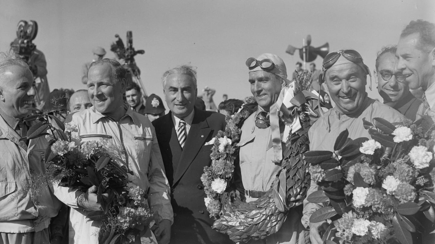 13th May 1950:  (from left to right) British racing driver Reg Parnell (1911 - 1964), Italian