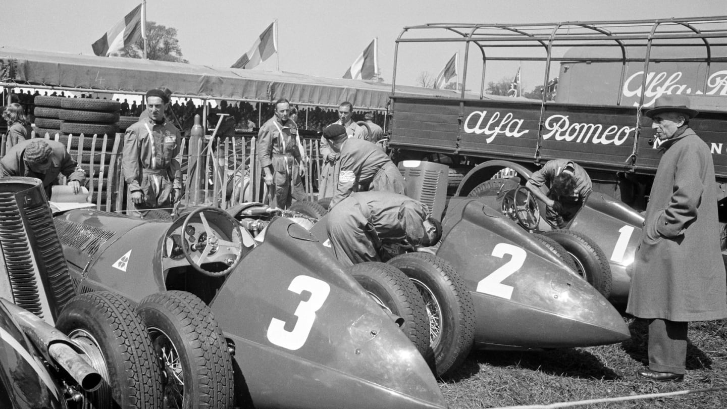 The British Grand Prix; Silverstone, May 13, 1950. The Alfa team cars in the paddock before the