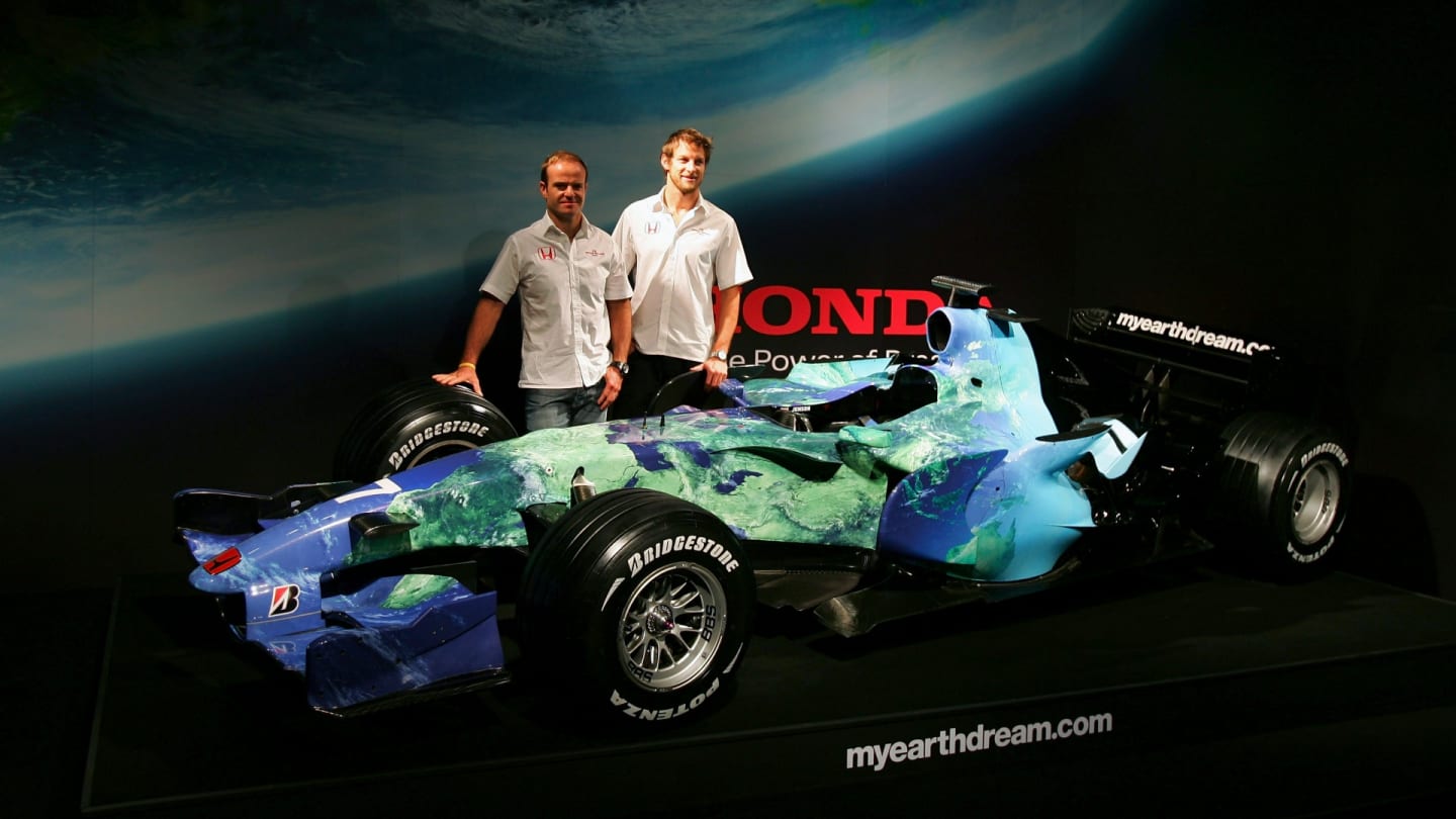 LONDON - FEBRUARY 26: Jenson Button of Great Britain and Honda Racing and Rubens Barrichello of