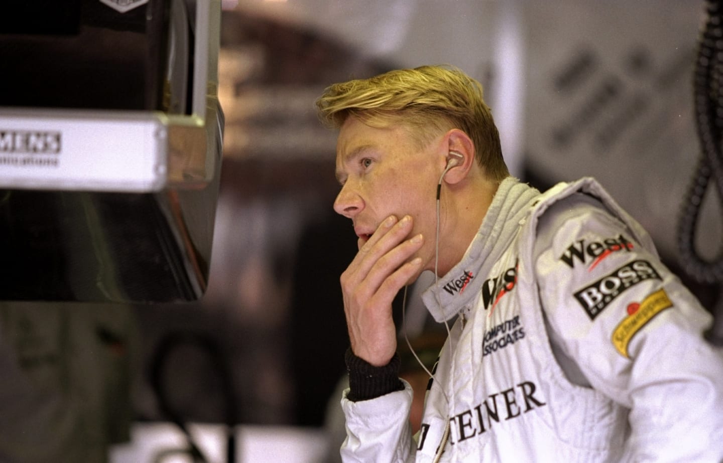 26 Jul 1998:  Mika Hakkinen of Finland and Mercedes-McLaren prepares himself for the race during