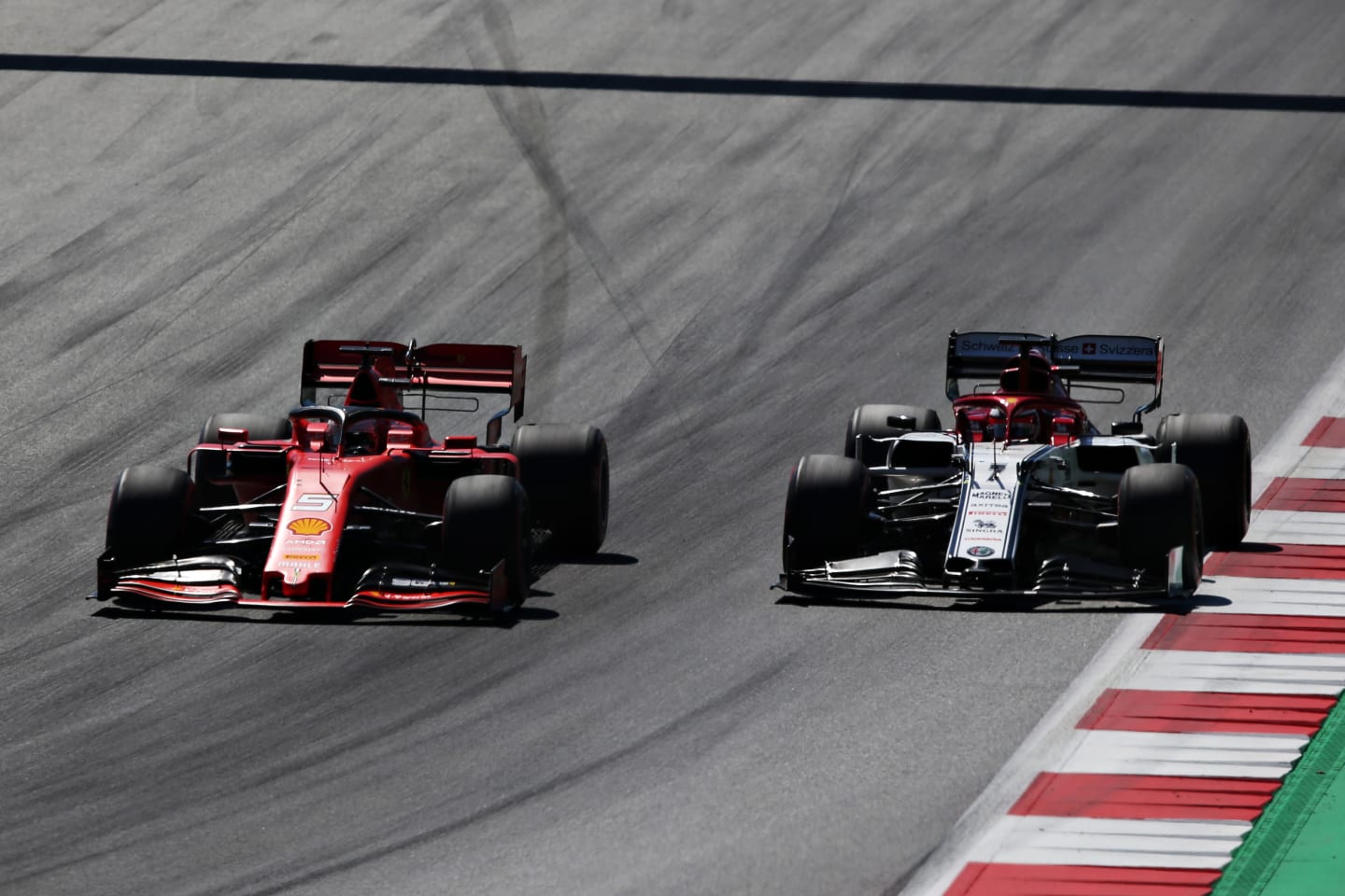 SPIELBERG, AUSTRIA - JUNE 30: Sebastian Vettel of Germany driving the (5) Scuderia Ferrari SF90 and