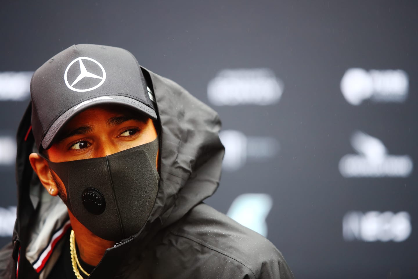 NUERBURG, GERMANY - OCTOBER 08: Lewis Hamilton of Great Britain and Mercedes GP looks on in the Paddock during previews ahead of the F1 Eifel Grand Prix at Nuerburgring on October 08, 2020 in Nuerburg, Germany. (Photo by Mark Thompson/Getty Images)