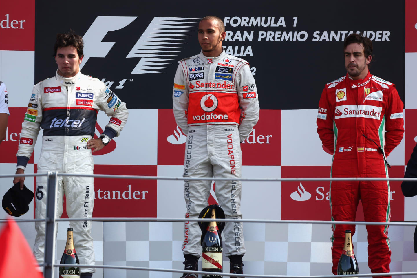 MONZA, ITALY - SEPTEMBER 09:  Race winner Lewis Hamilton (C) of Great Britain and McLaren